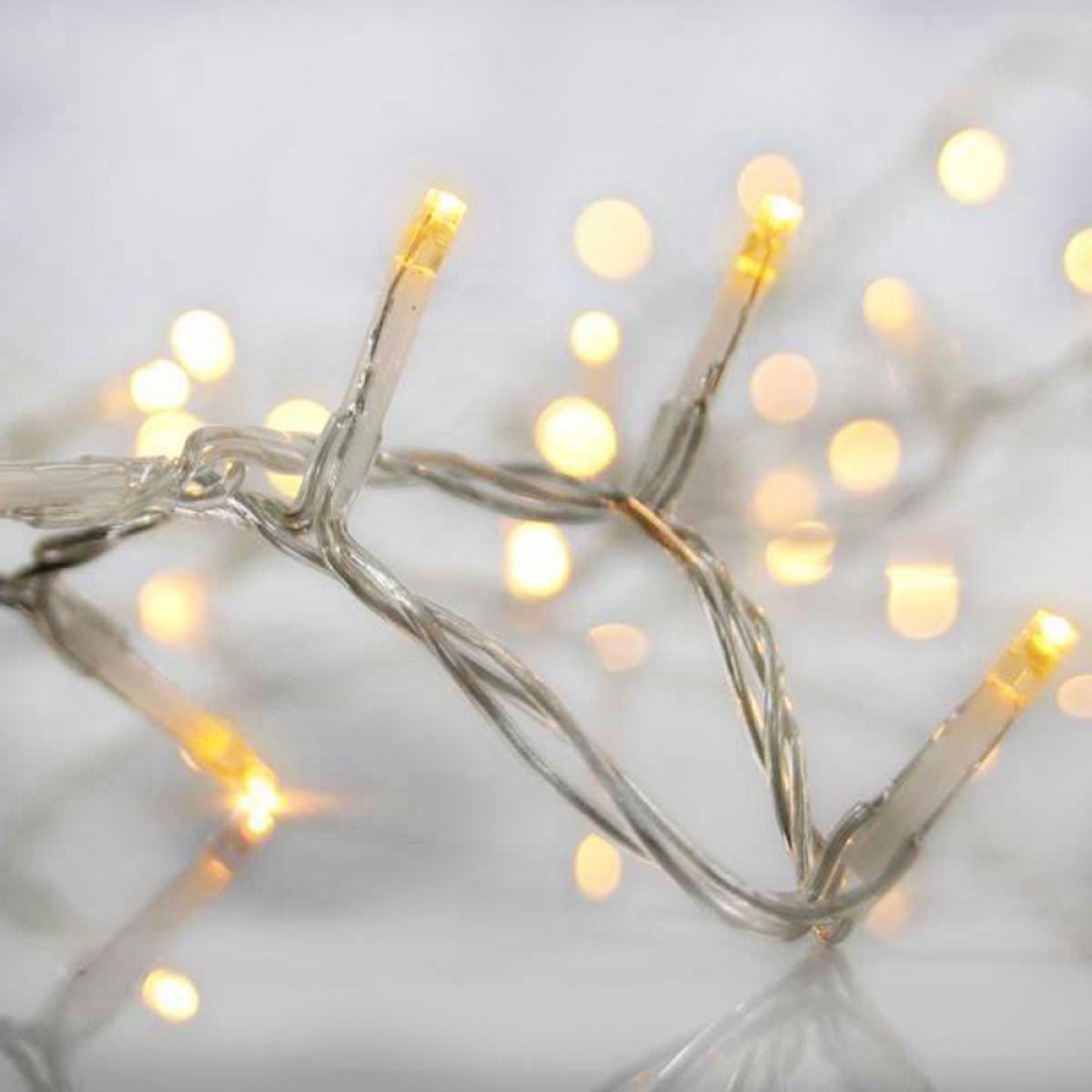 50 Χριστουγεννιάτικα Λαμπάκια LED Αδιάβροχα IP44 Θερμό Λευκό 5Μ σε Σειρά με Λευκό Καλώδιο Arrango AN57469 - Image 4