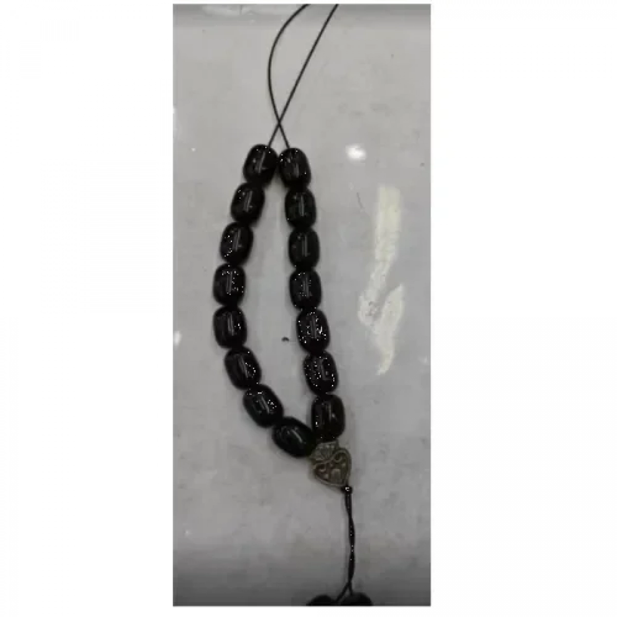 Κομπολόι με μαύρες χάντρες και μεταλλική καρδιά